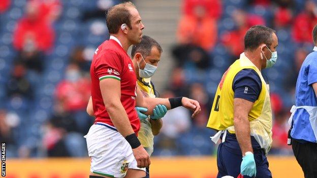 Alun Wyn Jones looks disappointed as he is taken from the field with a dislocated shoulder