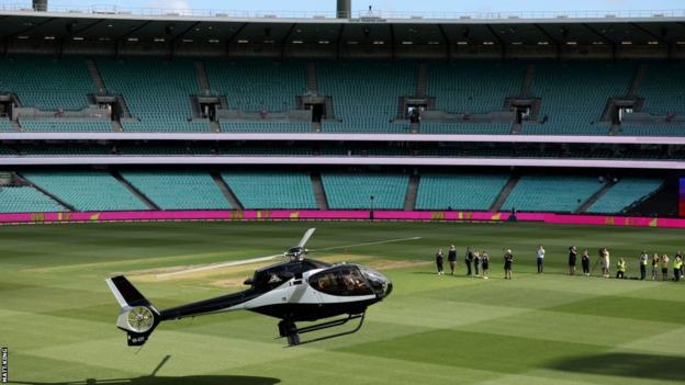David Warner arriving at the Sydney Cricket Ground by helicopter