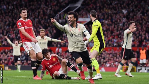 Mohamed Salah celebrates scoring for Liverpool against Manchester United at Old Trafford in the Premier League
