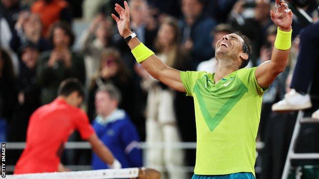 Rafael Nadal celebrates beating Novak Djokovic at the French Open