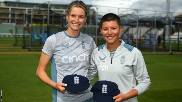 Lauren Bell (left) and Issy Wong (right) with their England Test caps