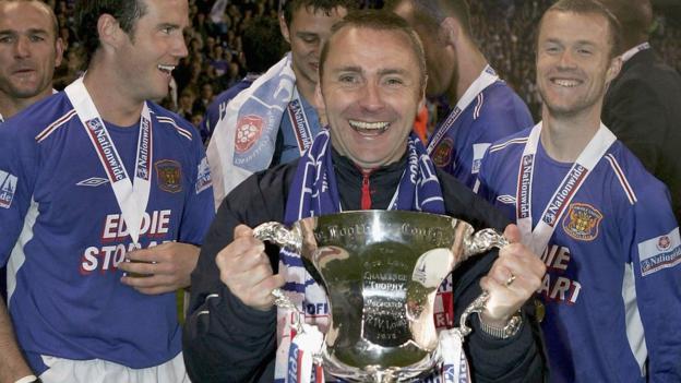 Paul Simpson pictured in 2005 after leading Carlisle United to promote to the Football League