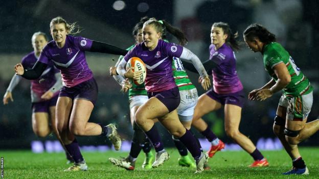 Megan Davey of Loughborough Lightning makes a break in their game against Leicester Tigers