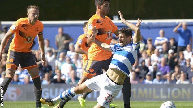 Tiago Ilori fouls Pawel Wszolek and is sent off for Reading v QPR