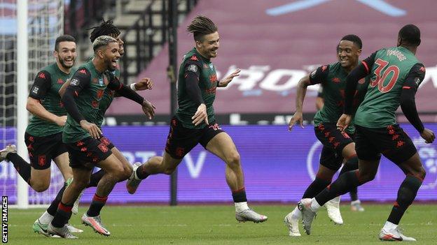 Jack Grealish (centre) and team-mates celebrate