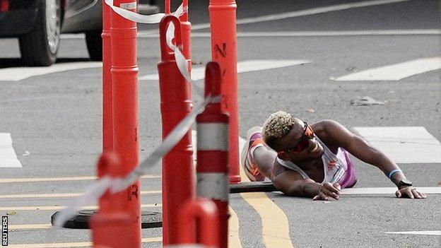 Brazil's Daniel Do Nascimento collapses during the elite men's race