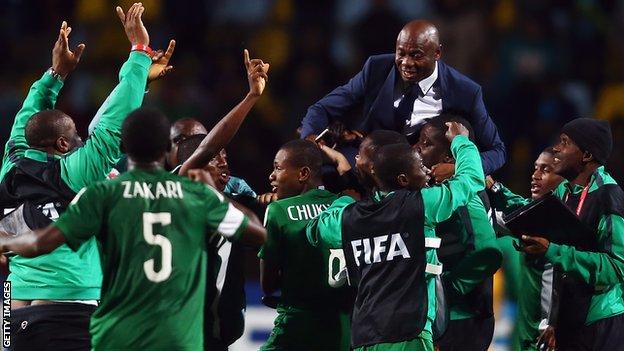 Nigeria's Emmanuel Amuneke carried on his player's shoulders after they won the 2015 Under-17 World Cup