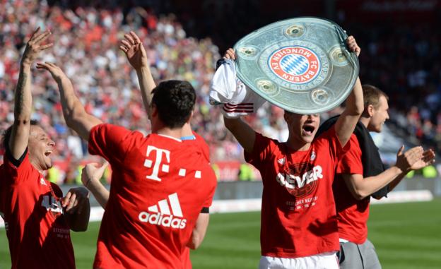 Bayern Munich players celebrate winning the Bundesliga