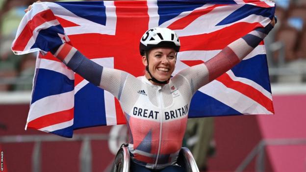 Hannah Cockroft celebrates one of her gold medals in Tokyo