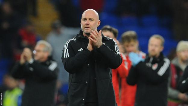Wales boss Robert Page applauds