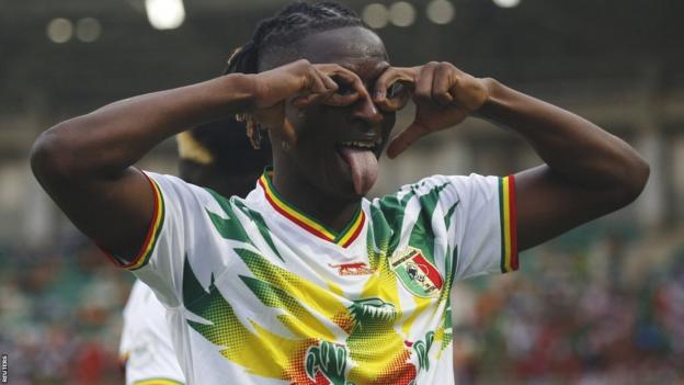 Amadou Haidara celebrates a goal for Mali against Burkina Faso