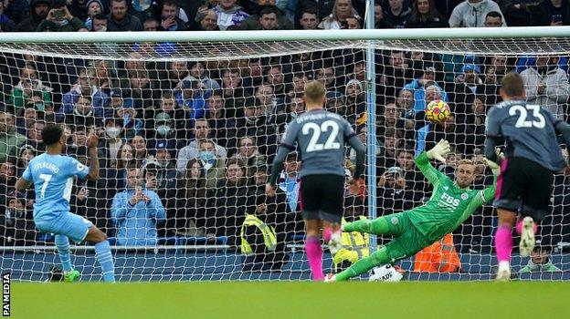 Raheem Sterling puts Manchester City 4-0 up from the penalty spot