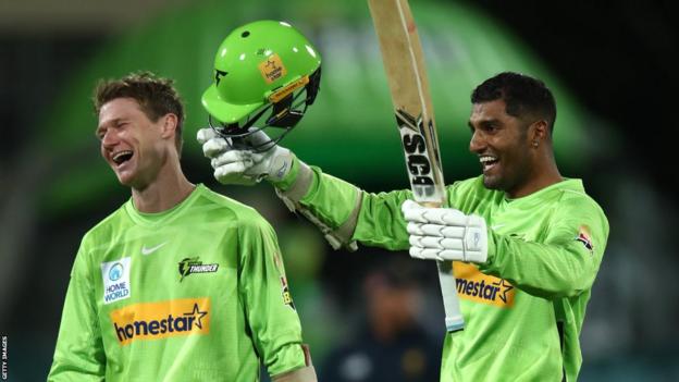 Thunder's Brendan Doggett and Gurinder Sandhu celebrate victory in League B game ig Bash between the Sydney T hunders and the Melbourne Stars at the Manuka Oval on December 13, 2022 in Canberra
