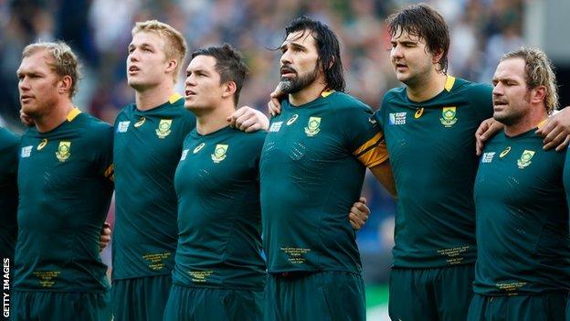 The South Africa team stand for their national anthem at the Rugby World Cup