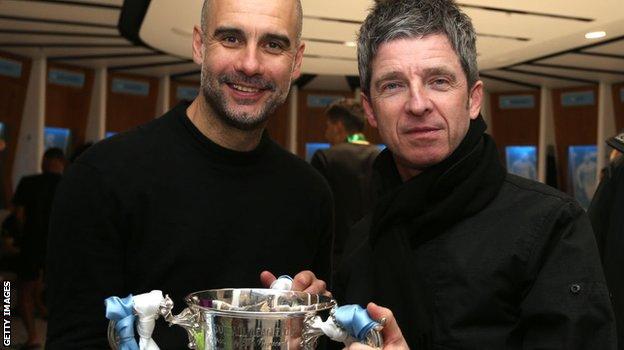 Pep Guardiola and Noel Gallagher celebrate City's Carabao Cup win at Wembley in 2020