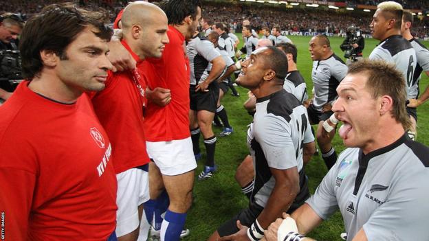 Christophe Dominici and Ali Williams face off as France advance on the New Zealand haka at the 2007 Rugby World Cup