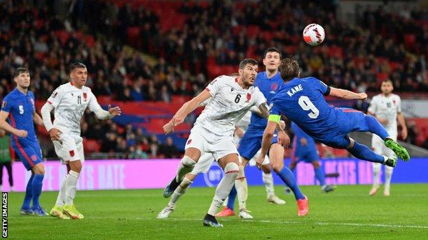 Harry Kane scores an acrobatic third against Albania