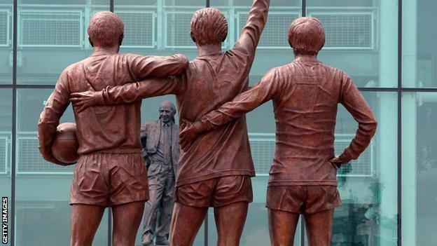 A statue of Sir Matt Busby stands outside Old Trafford today, opposite another one of three of his greatest players - Sir Bobby Charlton, Denis Law and George Best