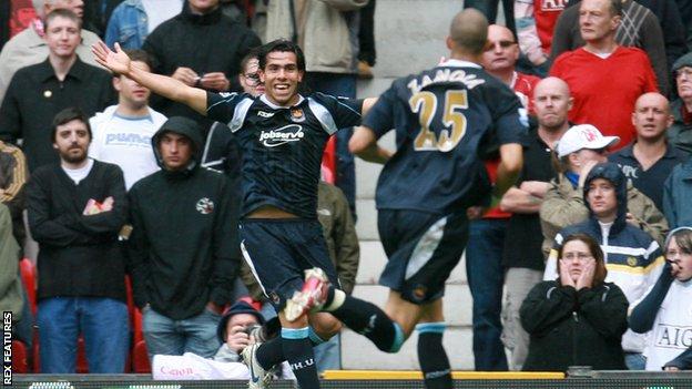 Carlos Tevez celebrates scoring for West Ham at Old Trafford