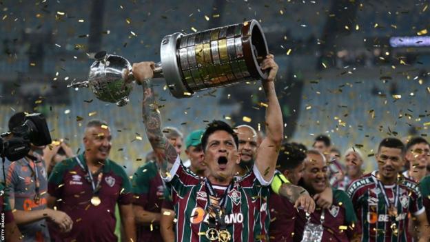 Fluminense's German Cano raises the trophy after winning the Copa Libertadores