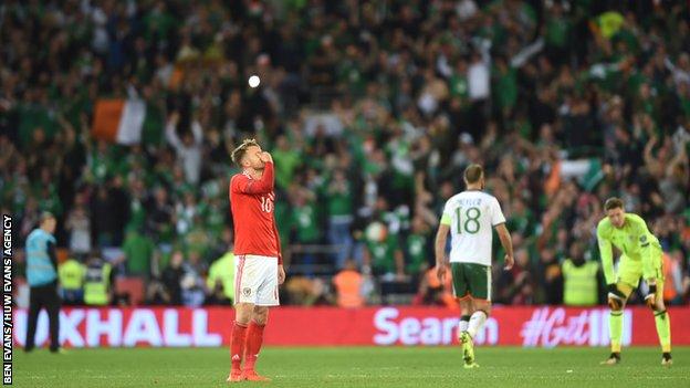 Wales midfielder Aaron Ramsey is dejected after losing to the Republic of Ireland