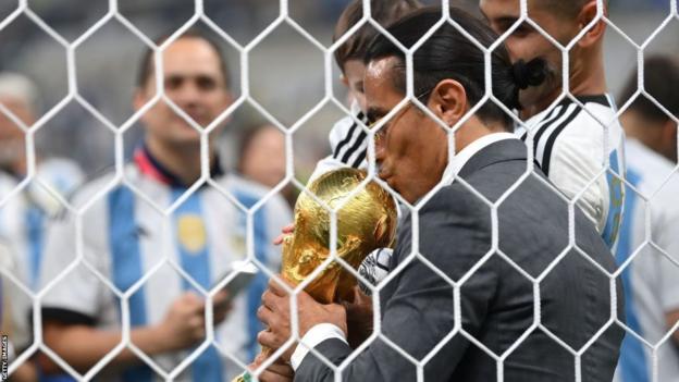 Salt Bae kissing the World Cup trophy