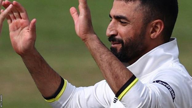 Zafar Gohar celebrates taking a wicket