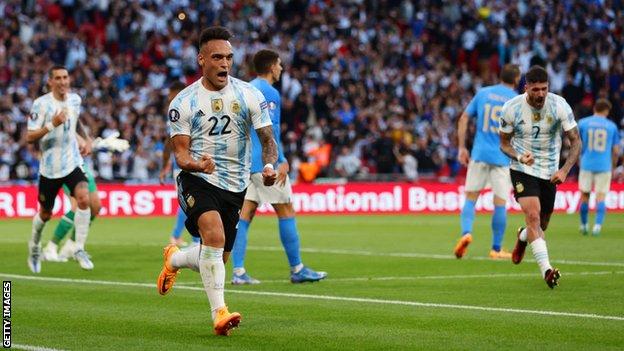 Lautaro Martinez celebrates to score the opening goal of Argentina
