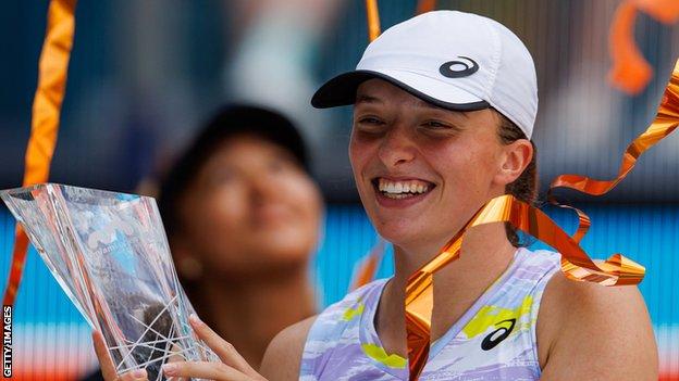 Iga Swiatek celebrates winning the Miami Open