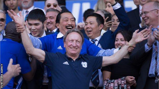 Neil Warnock and Vincent Tan celebrate