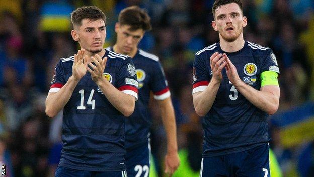 Scotland's Billy Gilmour and Andy Robertson suffer at full-time as Ukraine progress to face Wales in the play-off final