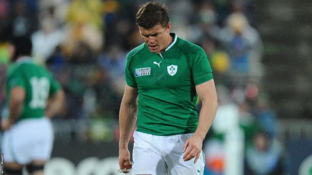 Brian O'Driscoll walks off the pitch after Ireland's quarter-finals defeat by Wales in 2011