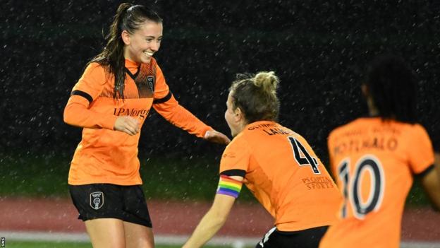 Abbie Larkin celebrates after scoring for Glasgow City