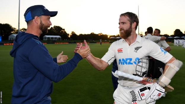 New Zealand players Devon Conway and Kane Williamson celebrate beating Sri Lanka