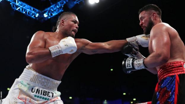 Joe Joyce throws a long jab at Joseph Parker in their heavyweight contest in Manchester in September