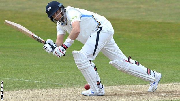 Joe Root plays a shot while playing for Yorkshire