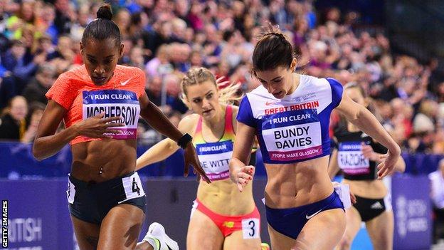 Seren Bundy-Davies (right) is beaten by Stephenie Ann McPherson (left) in the women's 400m at the Glasgow Indoor Grand Prix