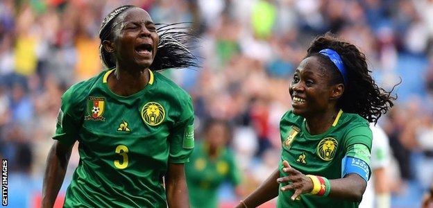 Cameroon striker Ajara Nchot (left) celebrates with Gabriel Onegin after she scored her second goal during the France 2019 Women's World Cup Group E match between Cameroon and New Zealand in 2019.