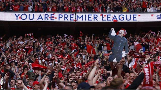 Nottingham Forest fans in front of the words 'You are Premier League;