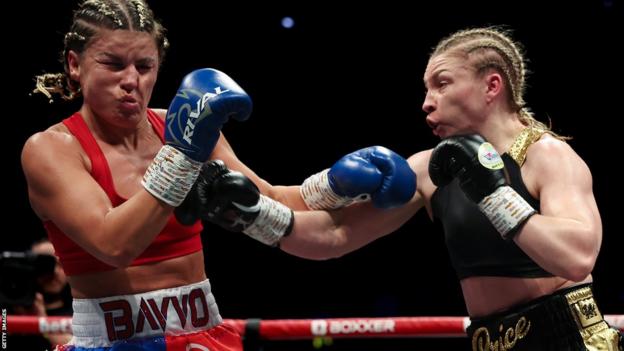 Lauren Price punches Kirstie Bavington during their fight in May