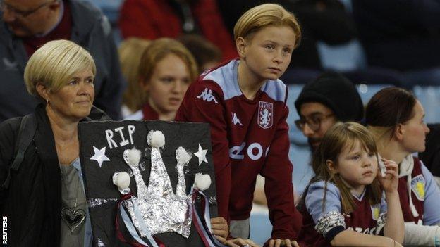 Aston Villa fans holding a tribute to Queen Elizabeth II