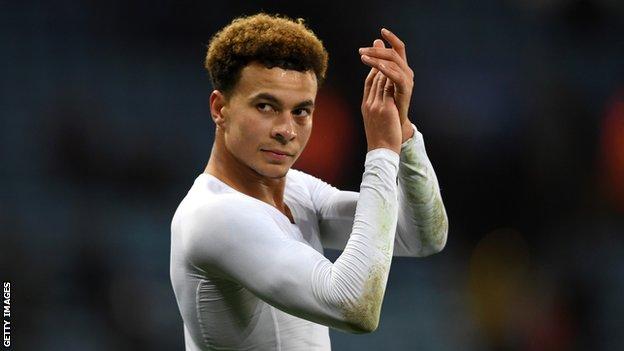 Tottenham midfielder Dele Alli applauds the fans as he walks off after victory over Leicester