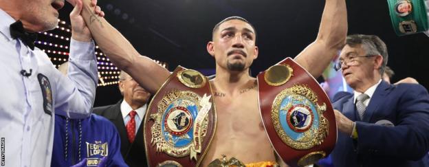 Teofimo Lopez with his belts