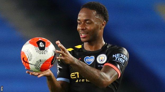 Manchester City forward Raheem Sterling celebrates after completing his hat-trick