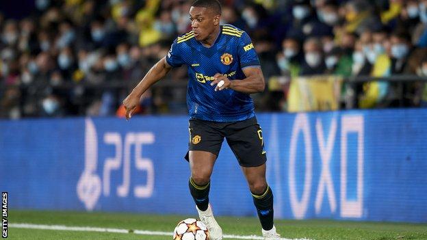 Anthony Martial runs with the ball