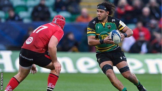 Lewis Ludlam with the ball for Northampton