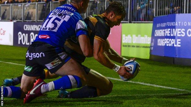 Josh Bassett scores a try for Wasps