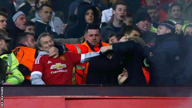Stewards had to step in as trouble flared between fans at Old Trafford