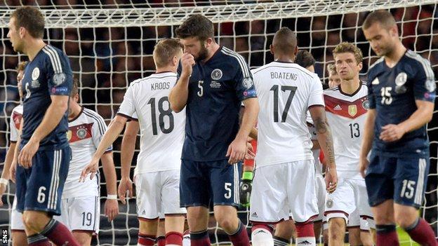 Scotland players show their disappointment as they lost 3-2 to Germany