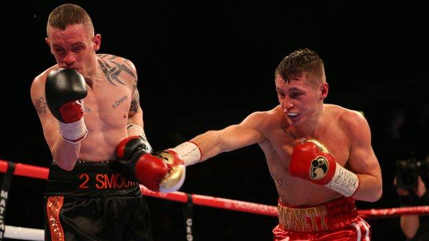 Jason Booth takes evasive action in the bout against Ryan Burnett